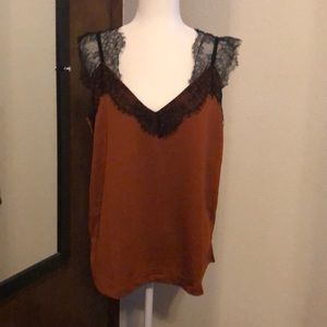Flowy top with lace trim. Size XL